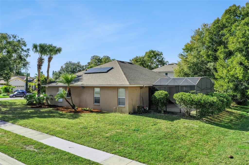 774 Lancer Circle Ocoee, FL 34761 - Photo 3 of 35 a front view of a house with garden