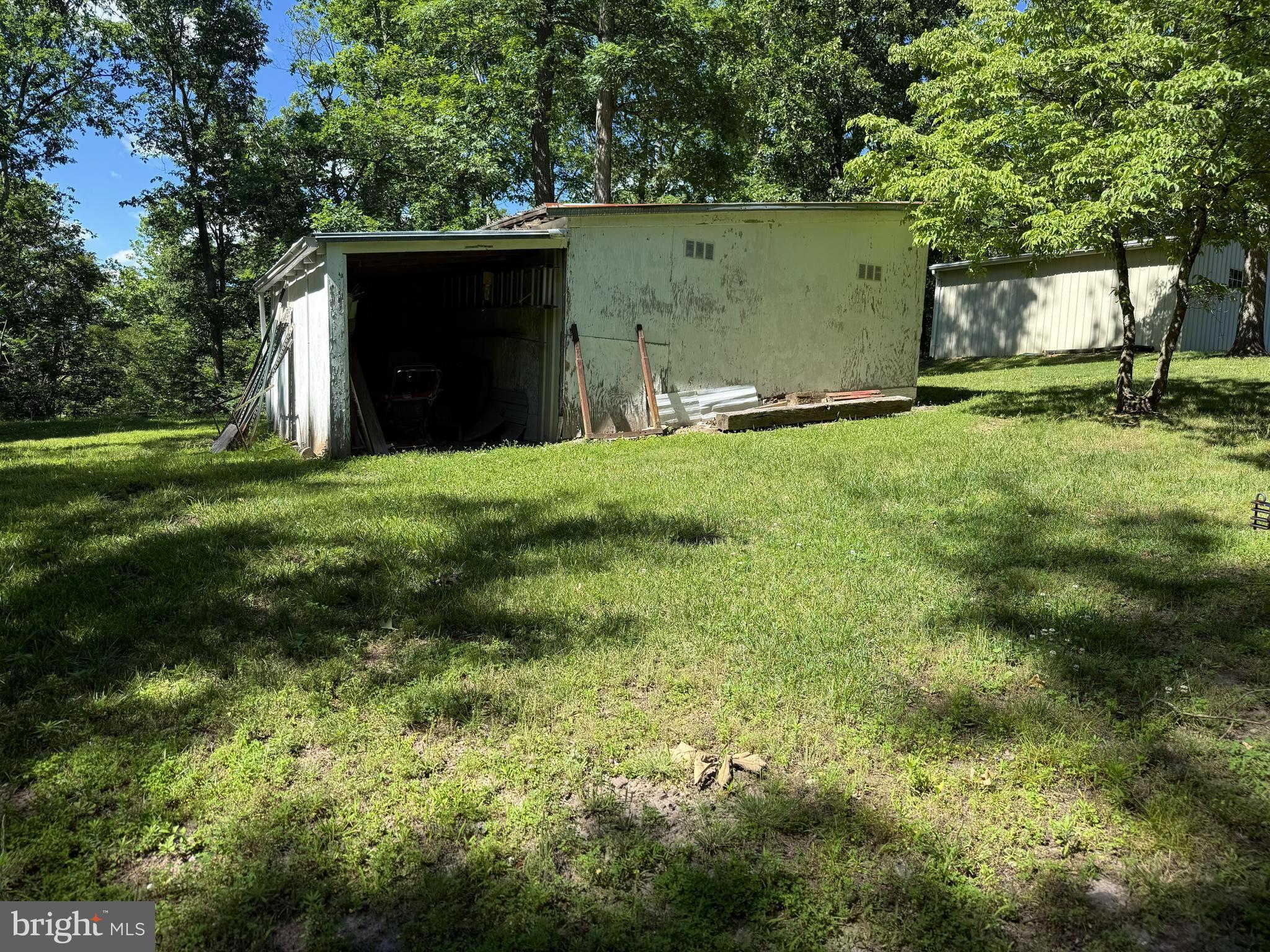 750 Hickory Corner Road Augusta, WV 26704 - Photo 31 of 49 Side of Storage Shed with Lean-to