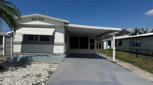 a front view of a house with a garage