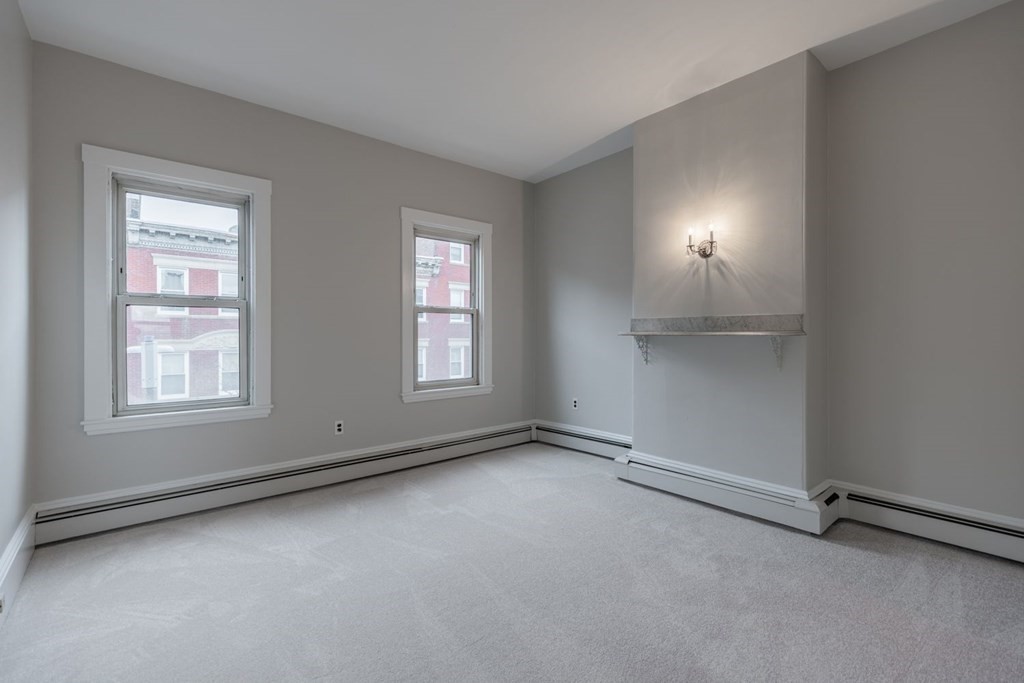32 High Street Boston, MA 02129 - Photo 24 of 38 an empty room with windows
