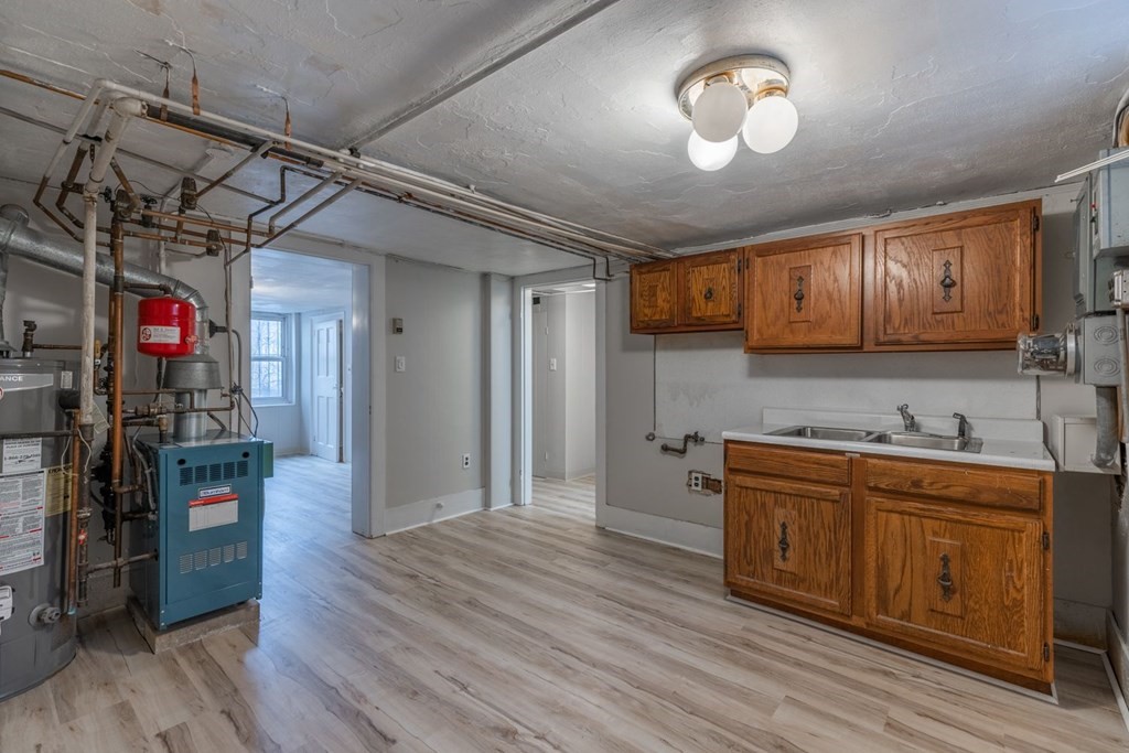 32 High Street Boston, MA 02129 - Photo 29 of 38 a view of a kitchen center island and wooden floor