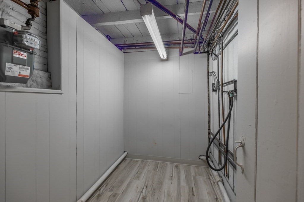 32 High Street Boston, MA 02129 - Photo 30 of 38 a view of storage and utility room with stairs