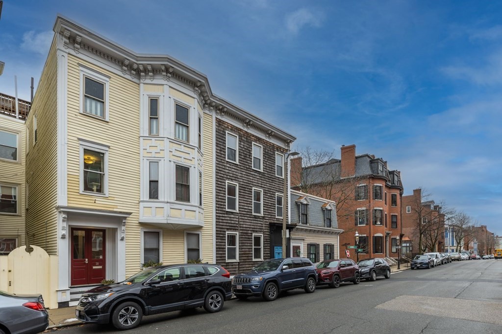 32 High Street Boston, MA 02129 - Photo 3 of 38 a couple of cars parked in front of a building