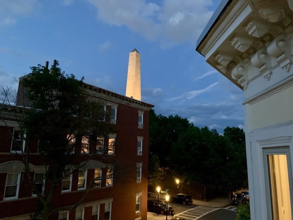 32 High Street Boston, MA 02129 - Photo 31 of 38 a front view of a house with garden