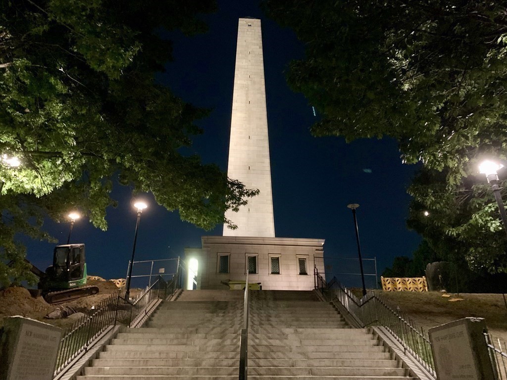 32 High Street Boston, MA 02129 - Photo 34 of 38 a view of a patio with table and chairs with wooden floor and fence