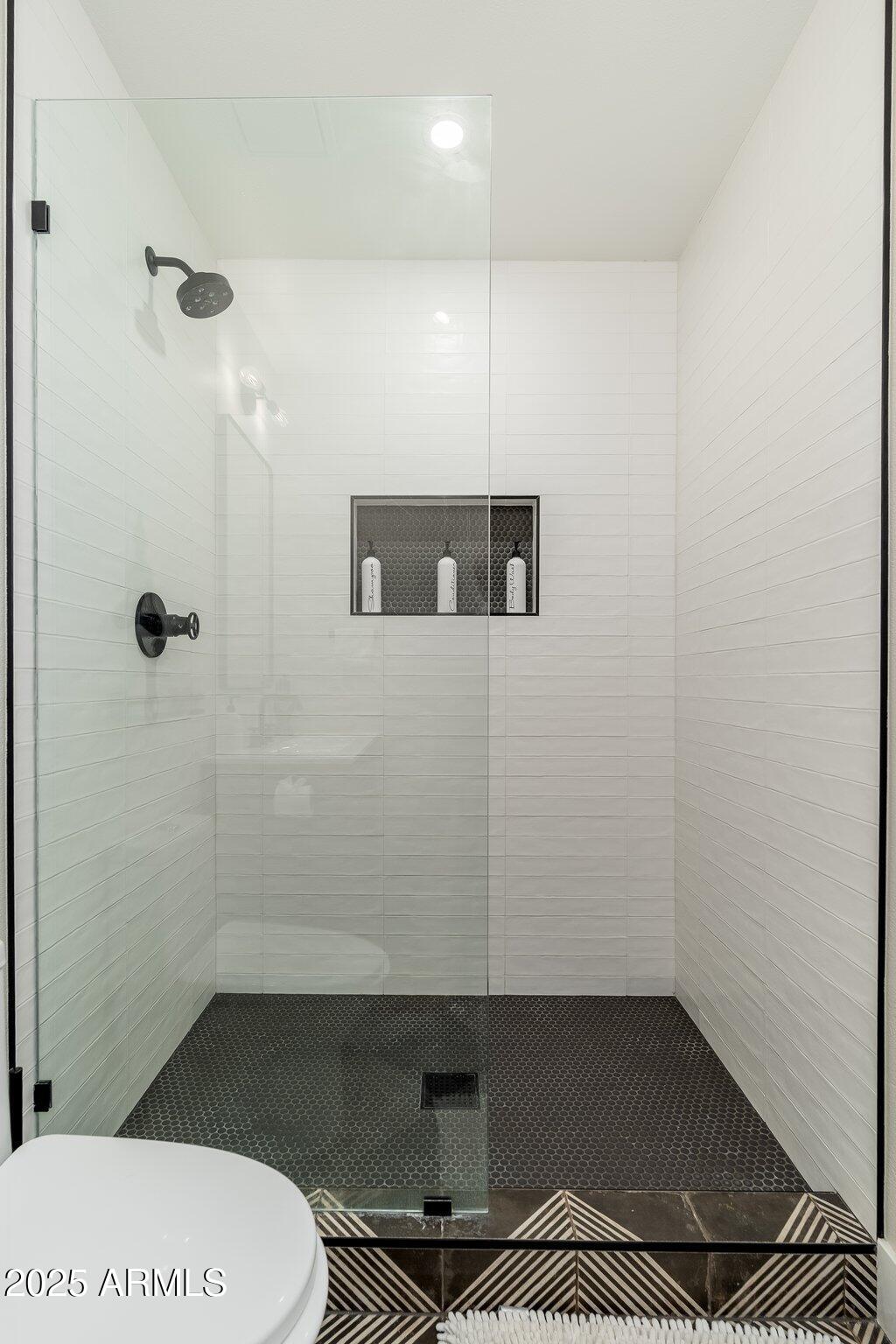 6957 East Osborn Road, Unit A Scottsdale, AZ 85251 - Photo 18 of 29 a bathroom with a toilet