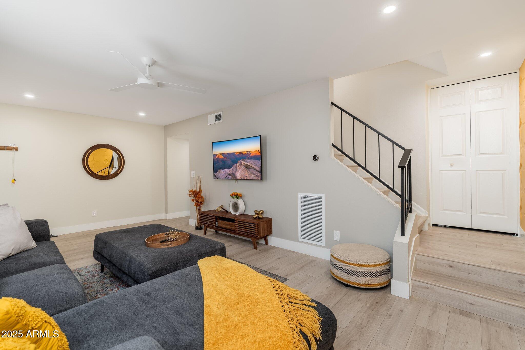 6957 East Osborn Road, Unit A Scottsdale, AZ 85251 - Photo 7 of 29 a living room with furniture