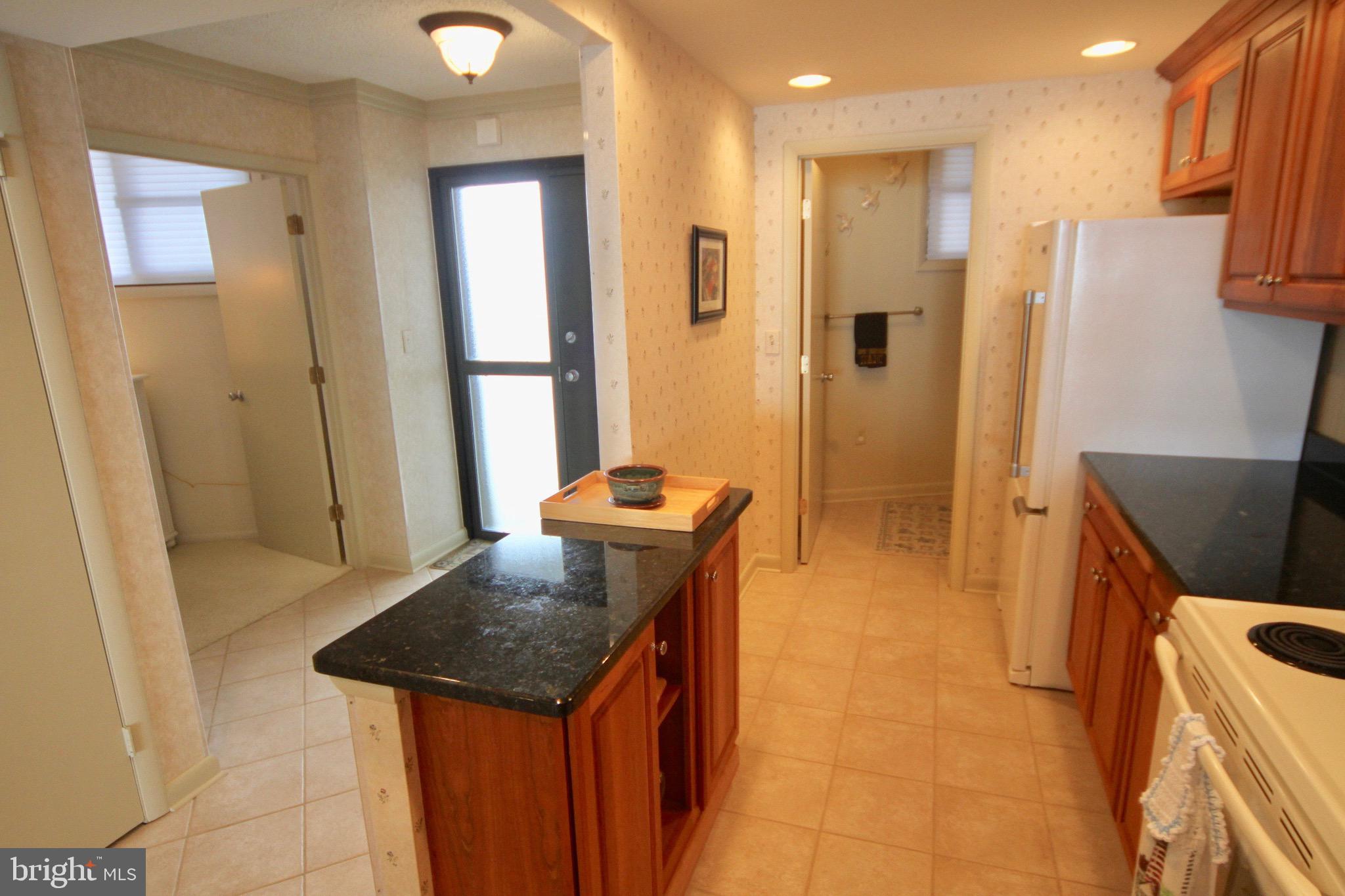 304 South Edgewater House Road Bethany Beach, DE 19930 - Photo 5 of 59 Peninsula offers more storage and prep space