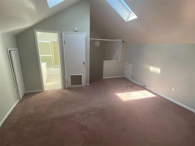 a view of empty room with windows