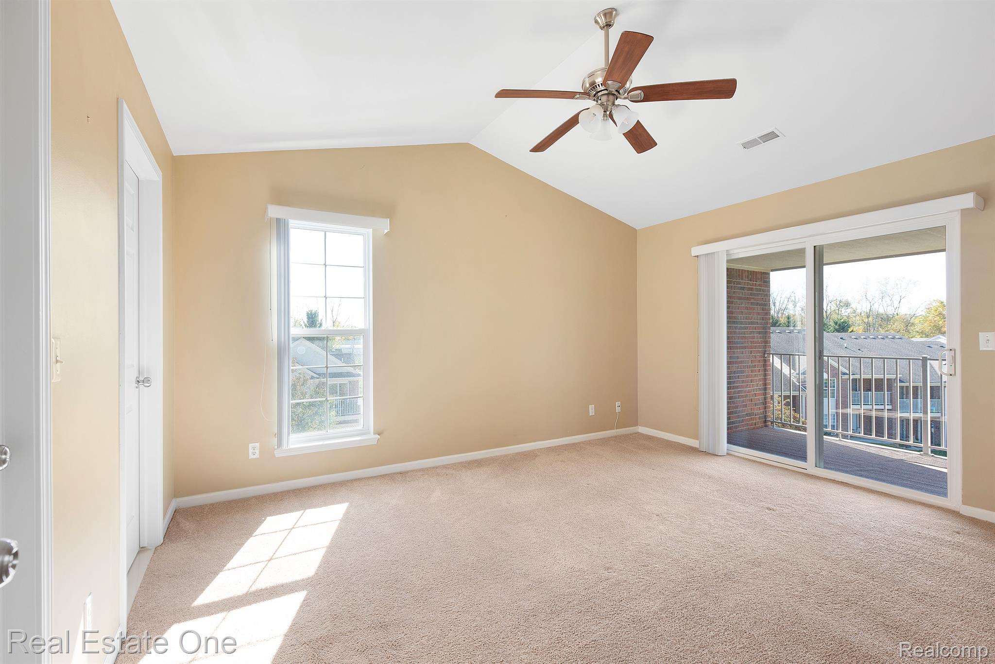 1845 Flagstone Circle Rochester, MI 48307 - Photo 13 of 29 Primary Bedroom with Door Wall to Balcony