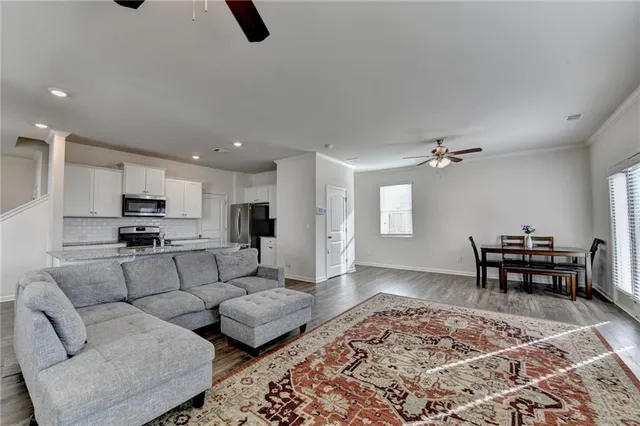 a living room with furniture and a couch