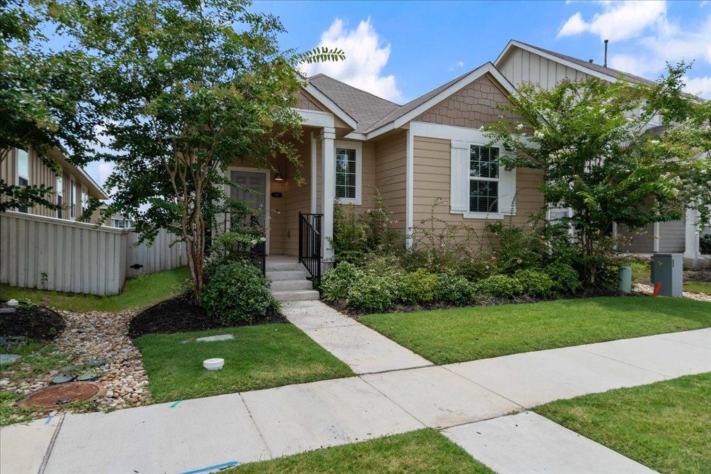330 Hortus Drive Kyle, TX 78640 - Photo 2 of 26 a front view of a house with garden