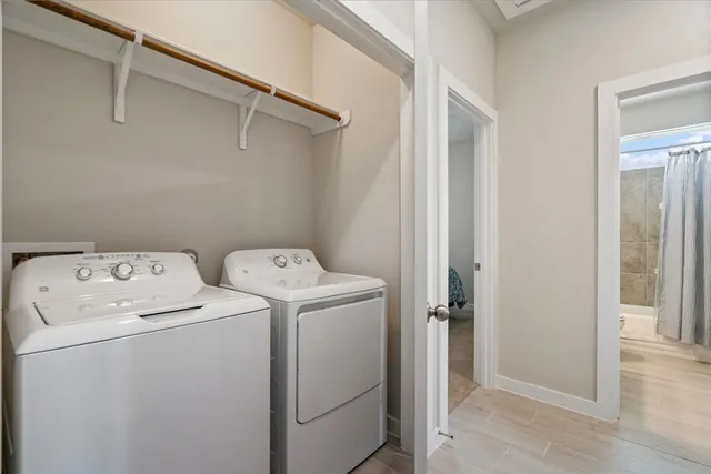a utility room with dryer and washer