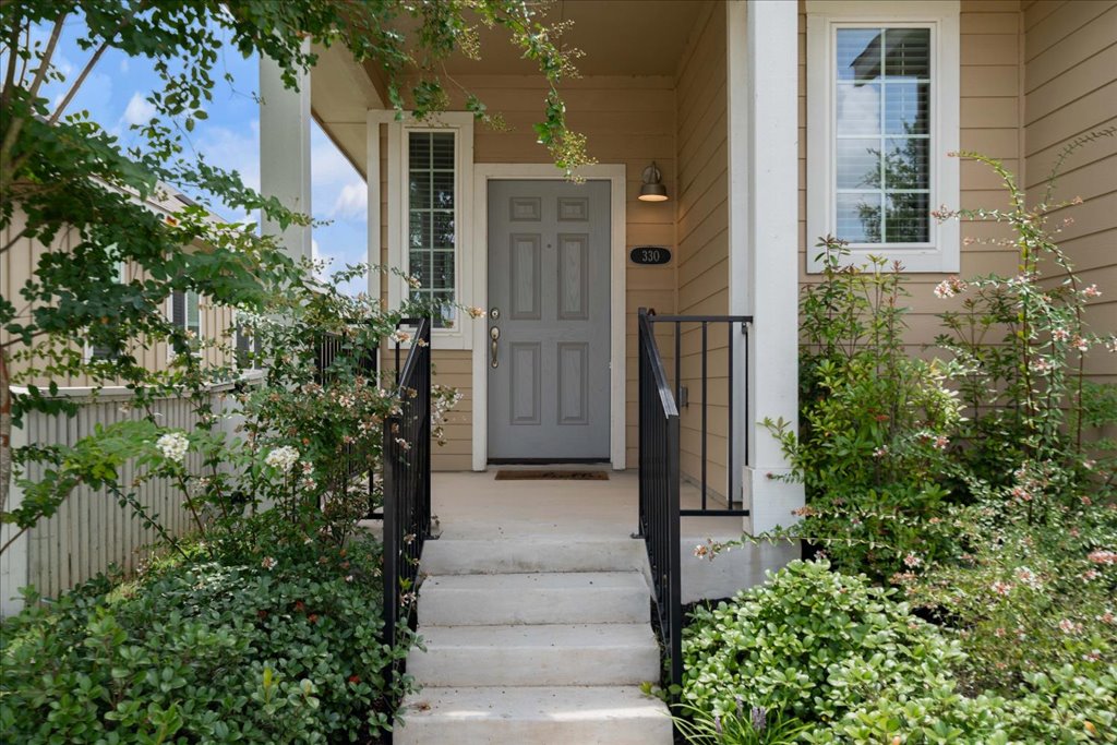330 Hortus Drive Kyle, TX 78640 - Photo 3 of 26 a view of a pathway of house with yard