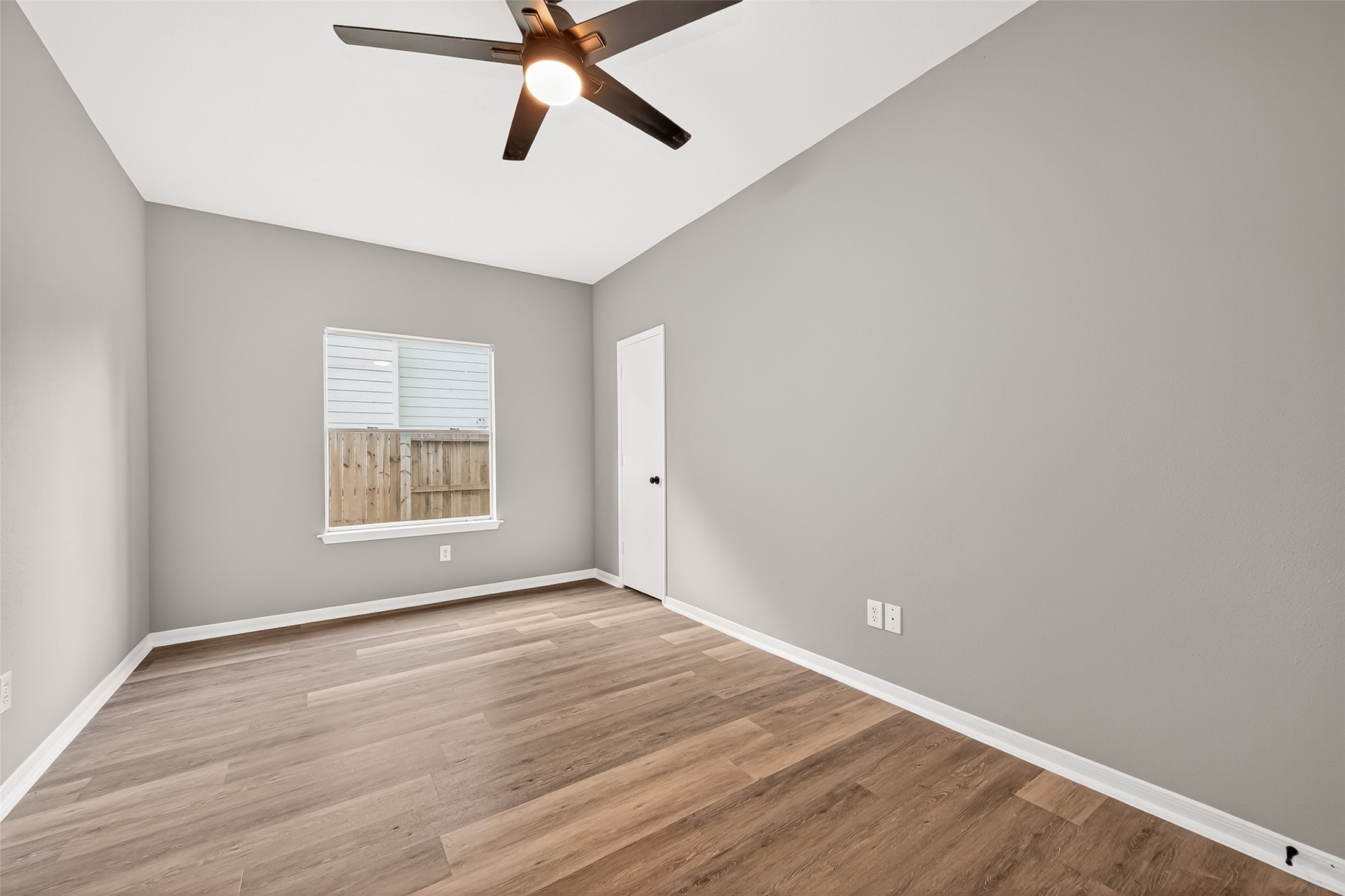 23810 Spring Way Drive Spring, TX 77373 - Photo 26 of 35 wooden floor in an empty room with a window