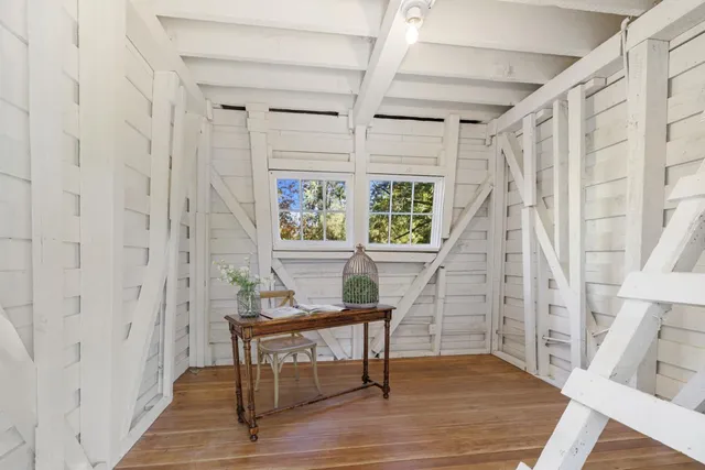 a kitchen with cabinets and a stove