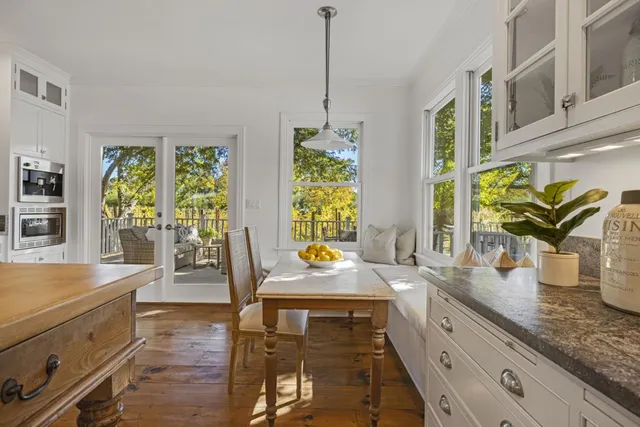a view of balcony with furniture and wooden deck