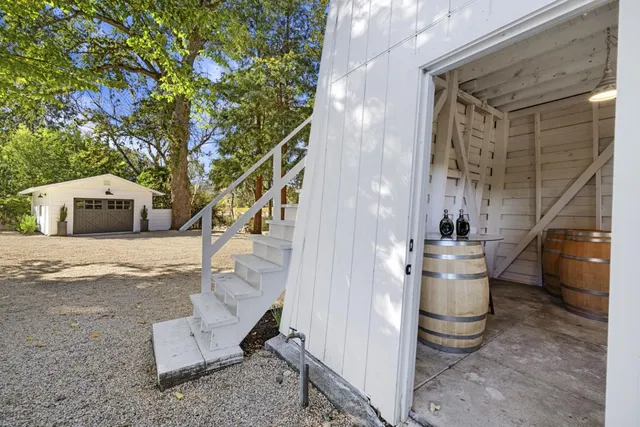 a kitchen with sink stove and refrigerator