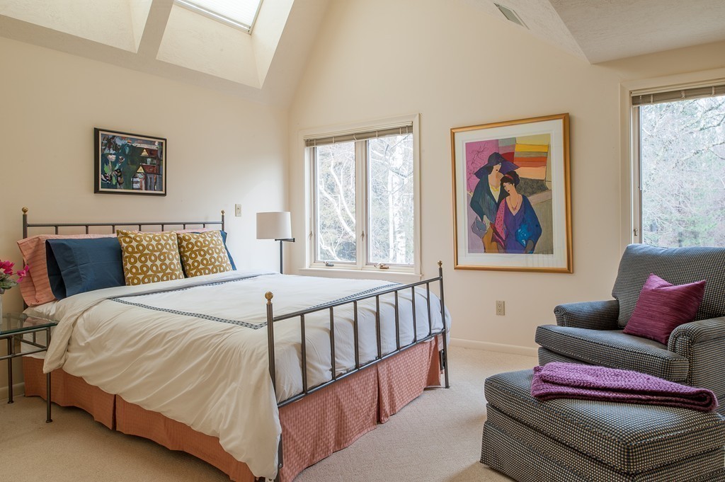 10 Rice Road Sudbury, MA 01776 - Photo 16 of 29 a bedroom with a bed and couch