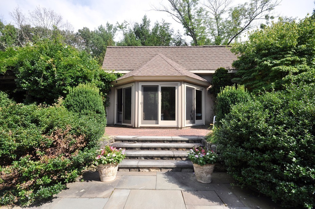 10 Rice Road Sudbury, MA 01776 - Photo 20 of 29 front view of a house with a yard