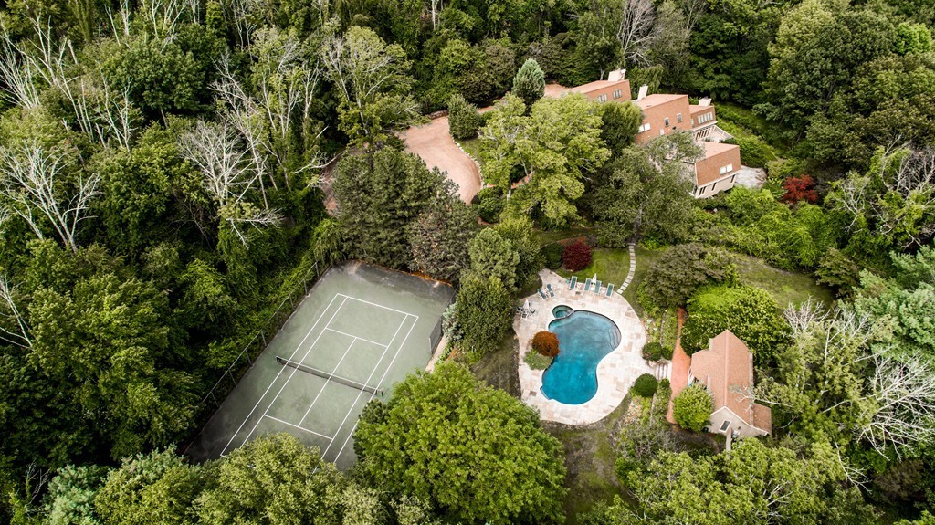 10 Rice Road Sudbury, MA 01776 - Photo 29 of 29 an aerial view of a house with a yard and large trees