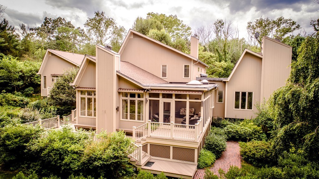10 Rice Road Sudbury, MA 01776 - Photo 5 of 29 front view of a house with a yard