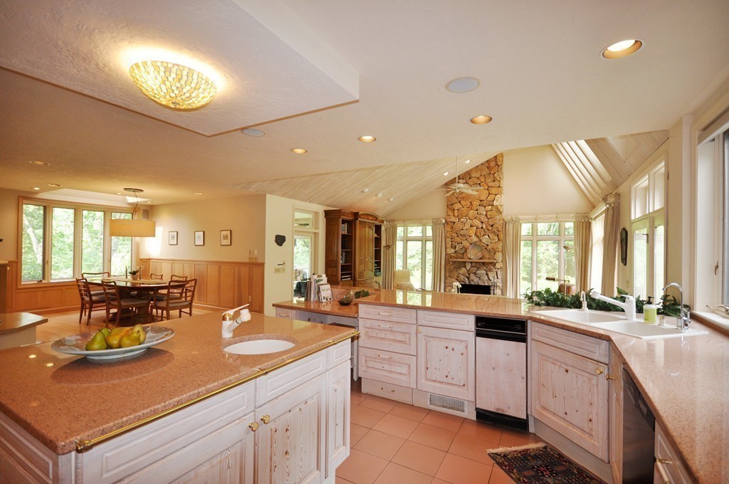 10 Rice Road Sudbury, MA 01776 - Photo 8 of 29 a kitchen with lots of counter top space and living room
