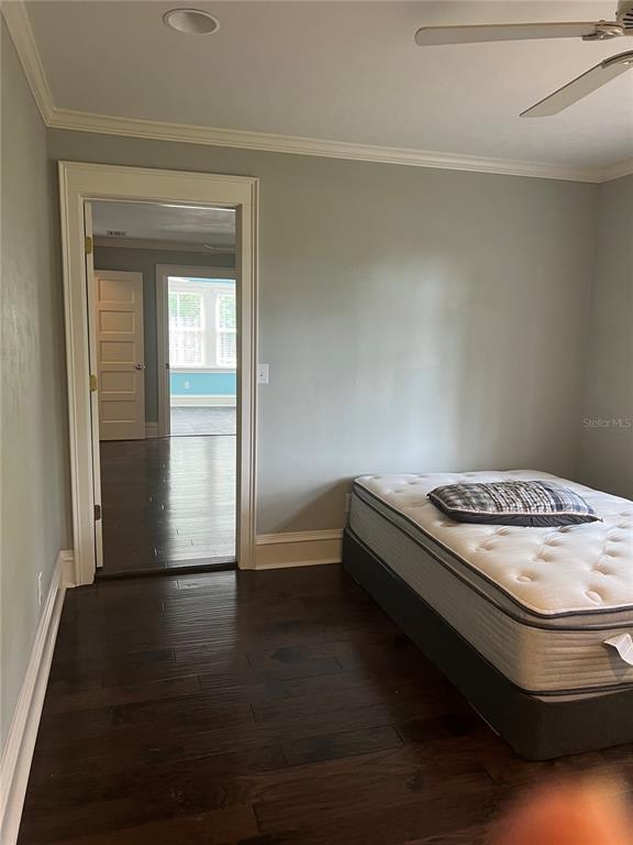 433 Southeast 7th Street Gainesville, FL 32601 - Photo 17 of 28 a bedroom with bed and window