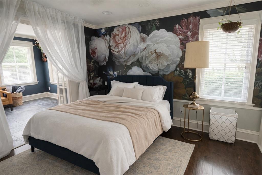 433 Southeast 7th Street Gainesville, FL 32601 - Photo 9 of 28 a bedroom with a large bed and a window