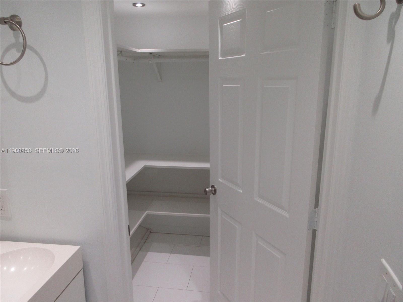 10835 Southwest 112th Avenue, Unit 305 Miami, FL 33176 - Photo 18 of 21 a bathroom with a bathtub