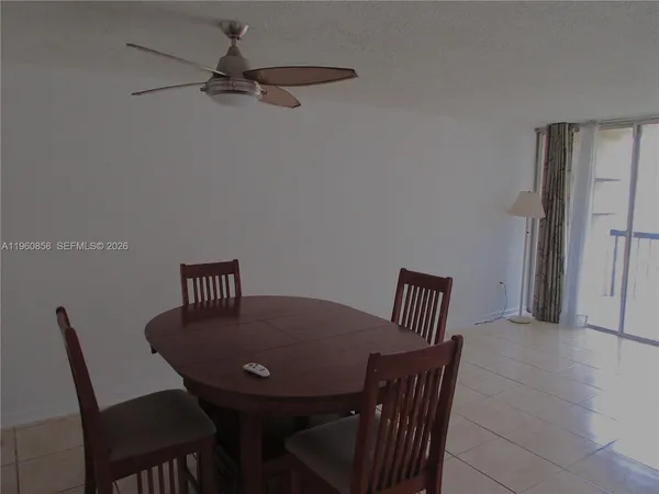 a living room with a couch and a flat screen tv