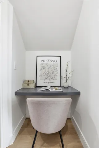 a view of a table chair in a room