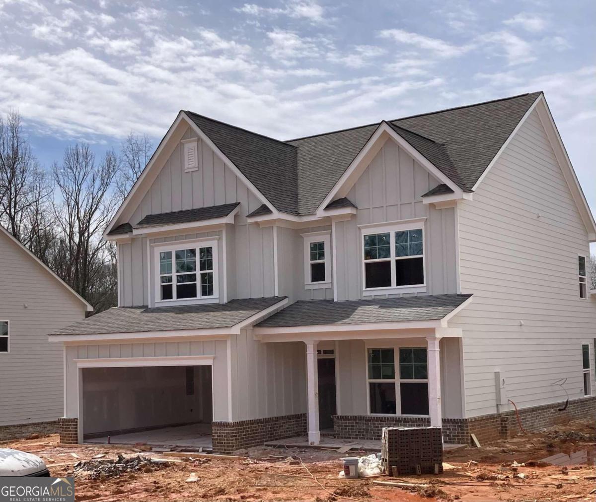 2495 West Liddell Road Duluth, GA 30096 - Photo 1 of 1 a front view of a house with a yard