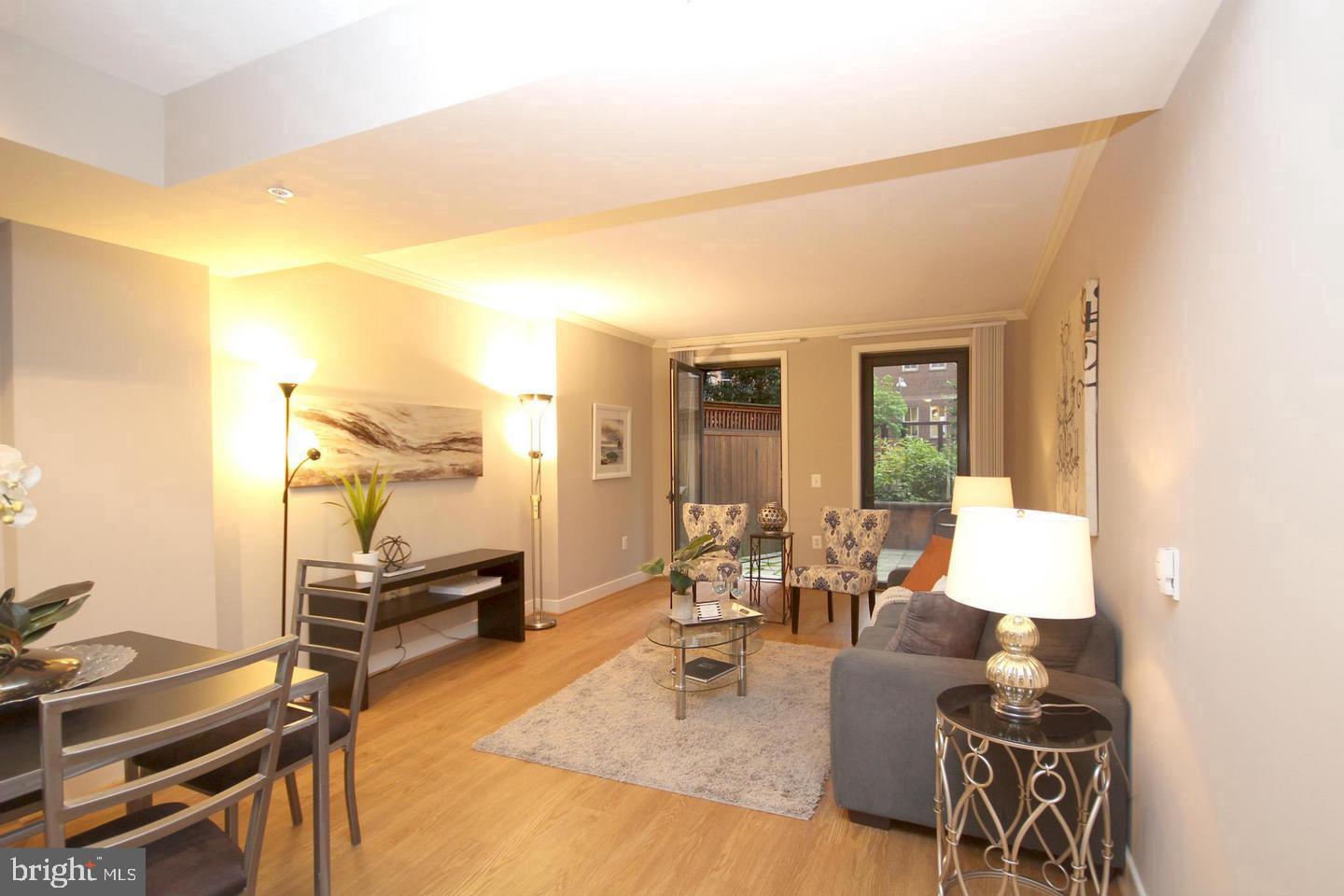 616 E Street Northwest, Unit 246 Washington, DC 20004 - Photo 8 of 40 a living room with furniture