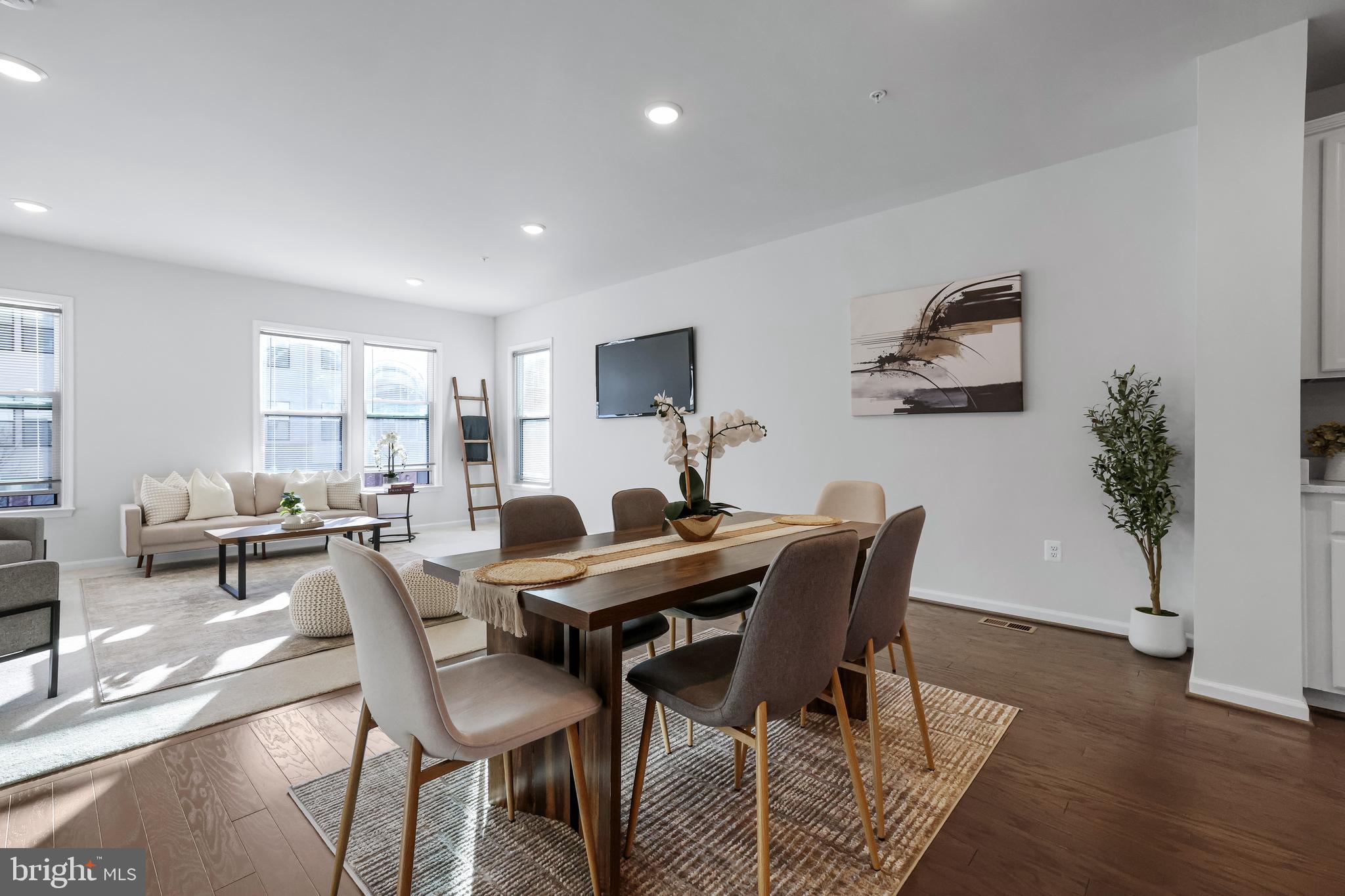 3238 Watershed Boulevard Laurel, MD 20724 - Photo 11 of 79 a view of a dining room with furniture window and wooden floor