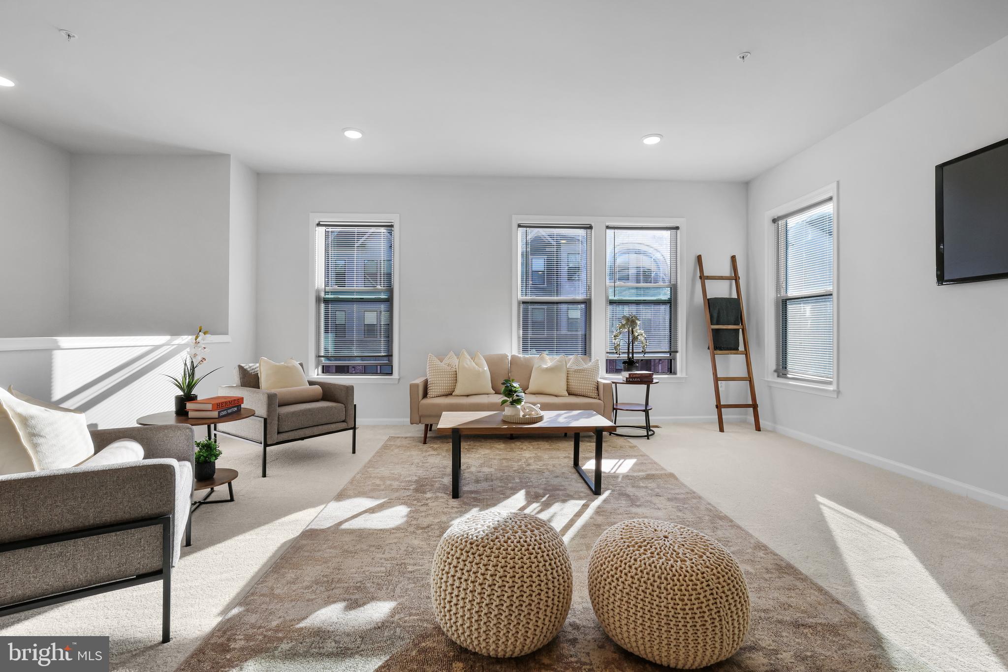 3238 Watershed Boulevard Laurel, MD 20724 - Photo 17 of 79 a living room with furniture and floor to ceiling window