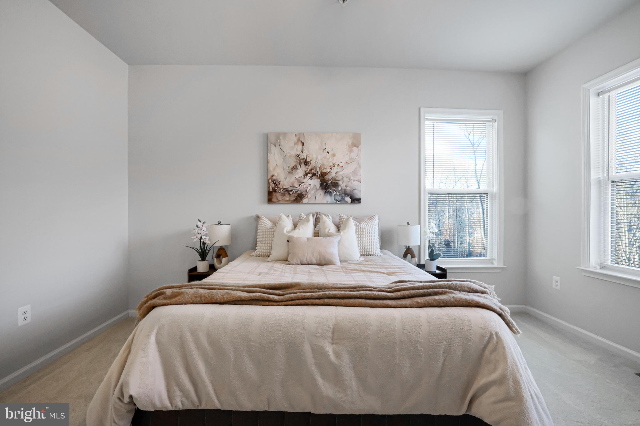 3238 Watershed Boulevard Laurel, MD 20724 - Photo 21 of 79 a bedroom with a bed and a window