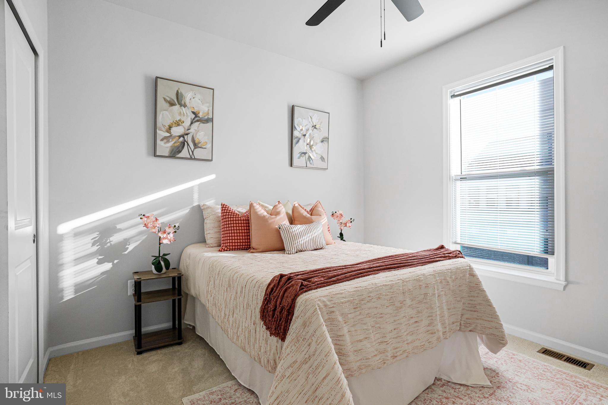 3238 Watershed Boulevard Laurel, MD 20724 - Photo 29 of 79 a bedroom with a bed and a window