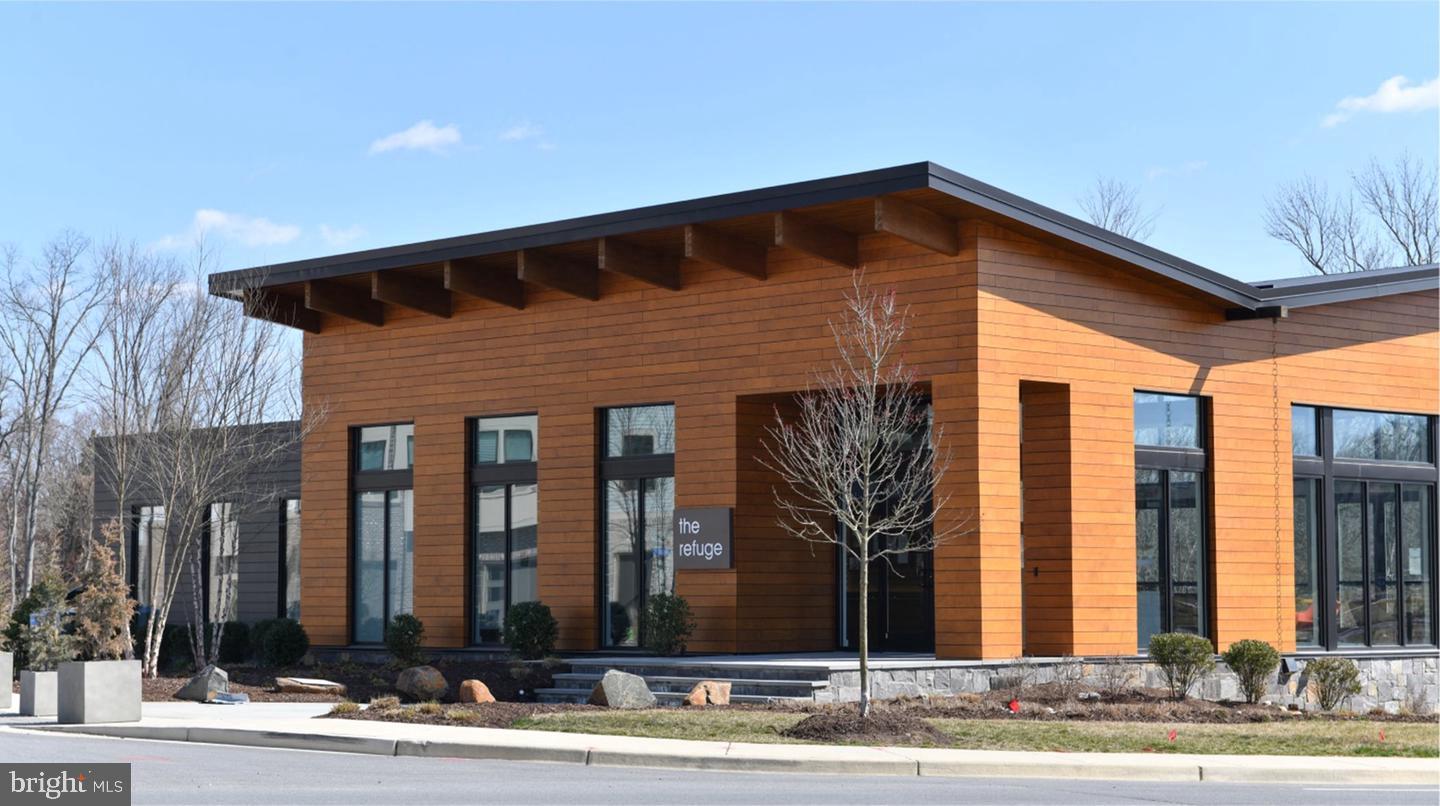 3238 Watershed Boulevard Laurel, MD 20724 - Photo 77 of 79 a front view of a house with a yard
