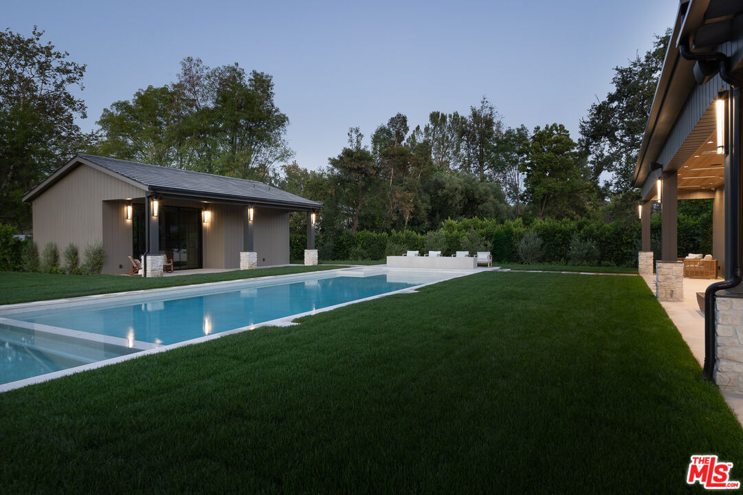 23615 Long Valley Road Hidden Hills, CA 91302 - Photo 72 of 75 a view of house with swimming pool and yard