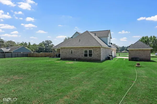 a house view with a garden space