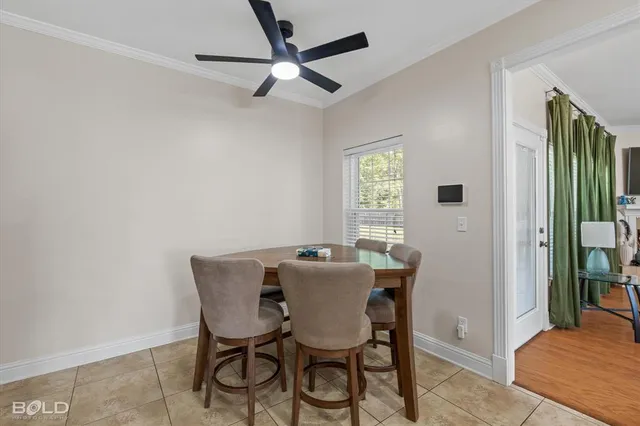 a kitchen with stainless steel appliances kitchen island granite countertop a sink and cabinets