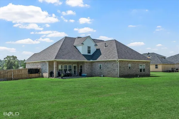 a view of a yard in front of a house