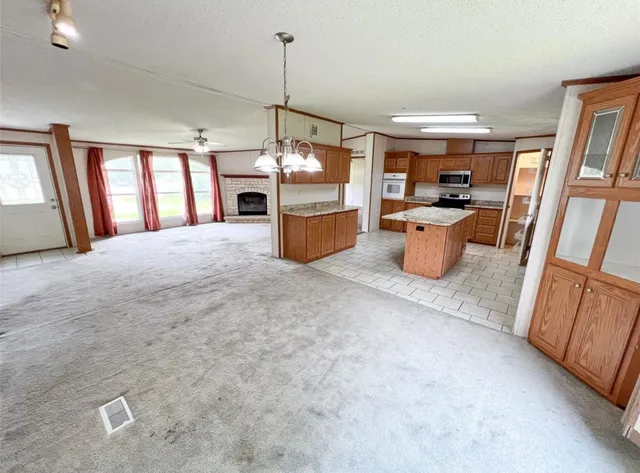 a view of a living room and a window