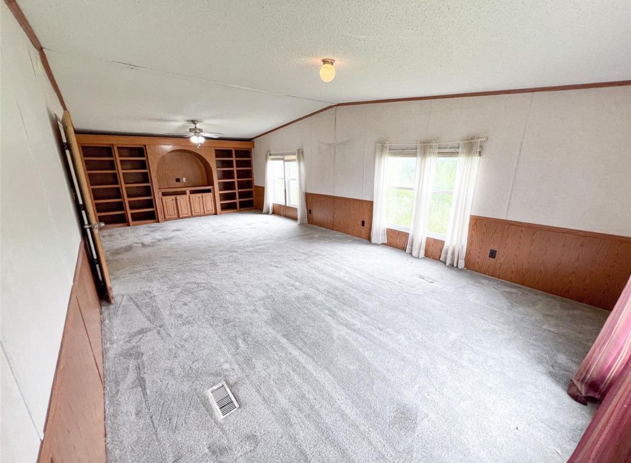 24450 Cunningham Drive Porter, TX 77365 - Photo 8 of 9 a view of empty room with wooden floor and fan