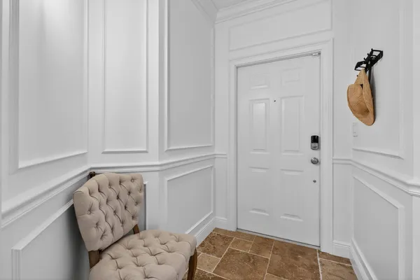 a kitchen with a sink appliances and cabinets