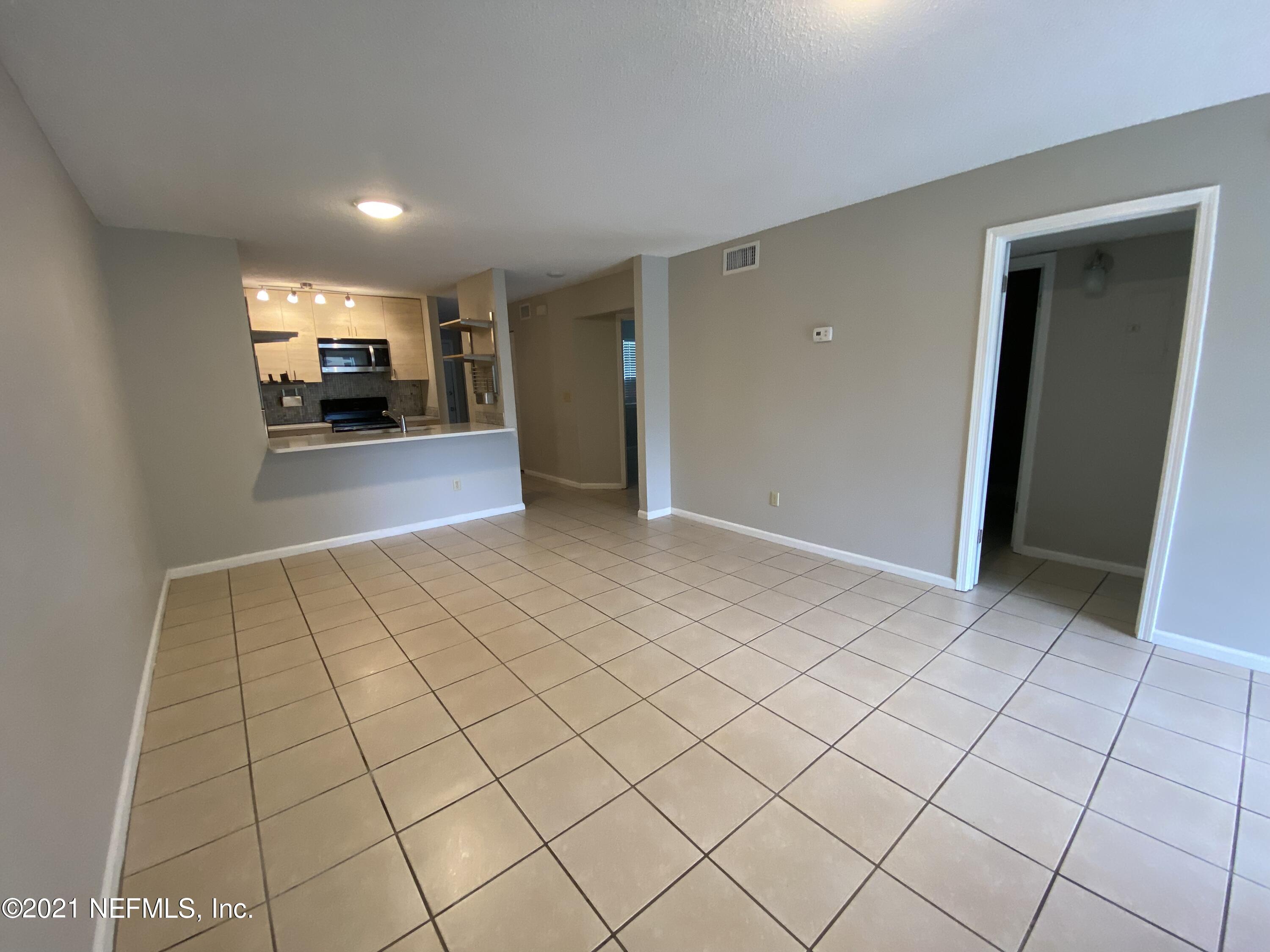 3270 Ricky Drive, Unit 1801 Jacksonville, FL 32223 - Photo 12 of 22 Living/Dining Combo 2