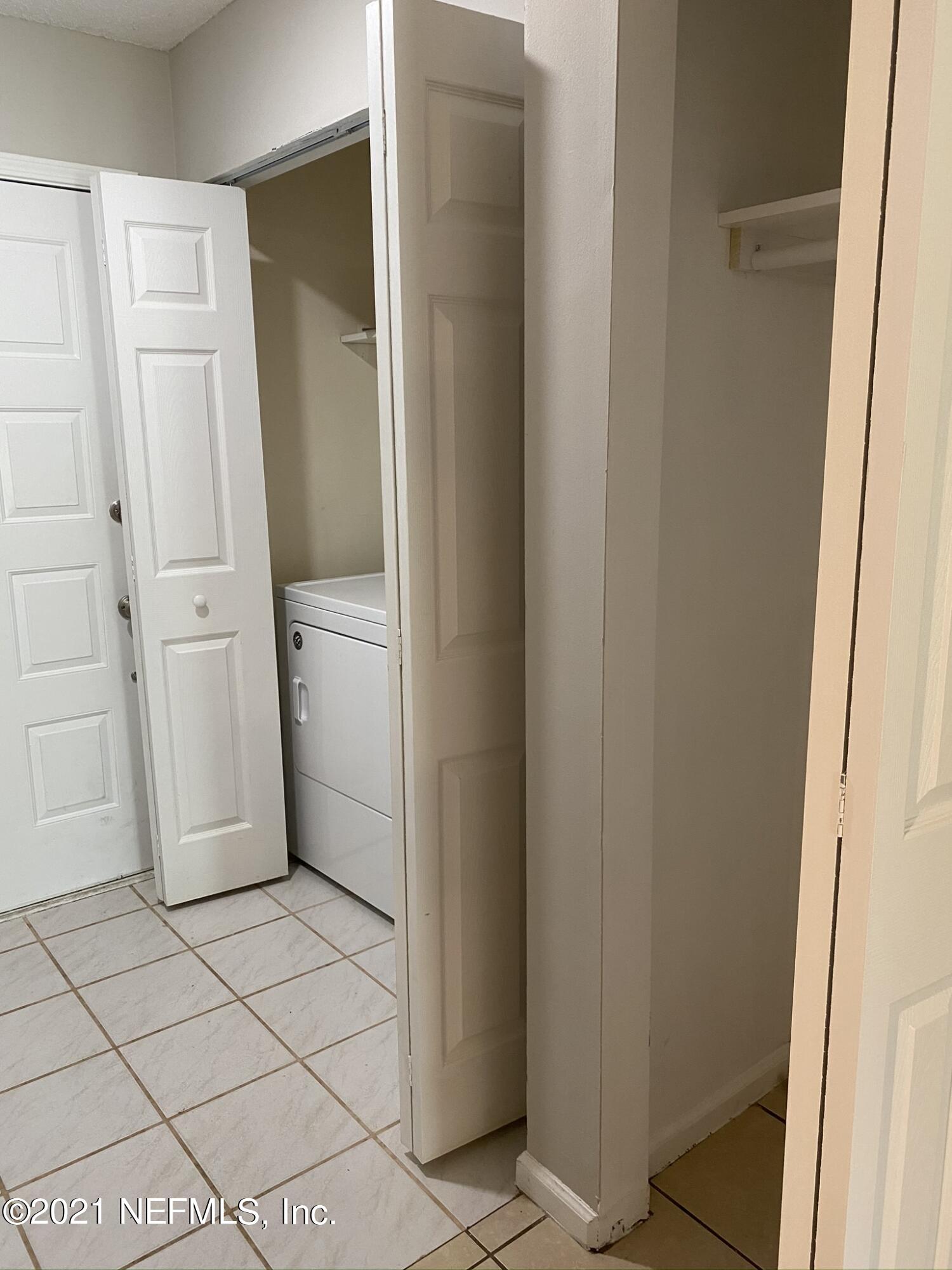 3270 Ricky Drive, Unit 1801 Jacksonville, FL 32223 - Photo 4 of 22 Laundry and Cost Closet
