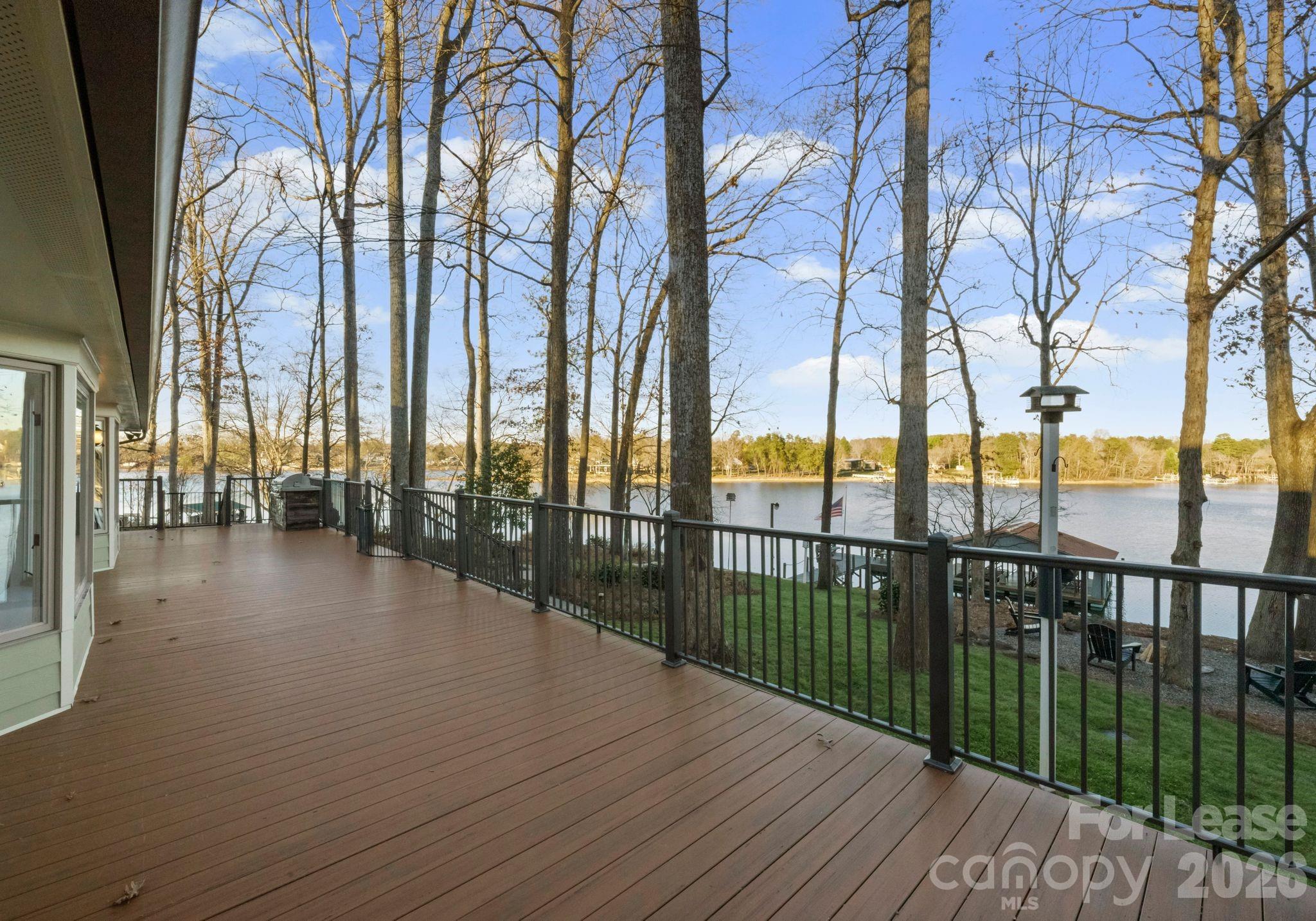 19709 Stough Farm Road Cornelius, NC 28031 - Photo 28 of 48 a view of a balcony with trees