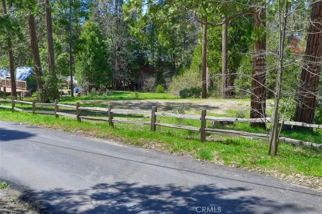 a view of a garden with houses